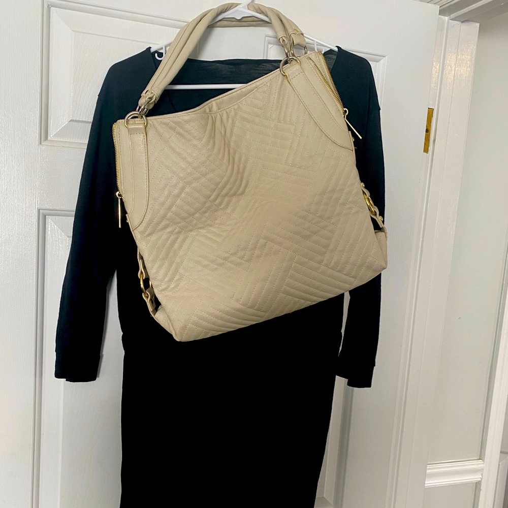 Large black jumpsuit.  Brand new with two handbags included